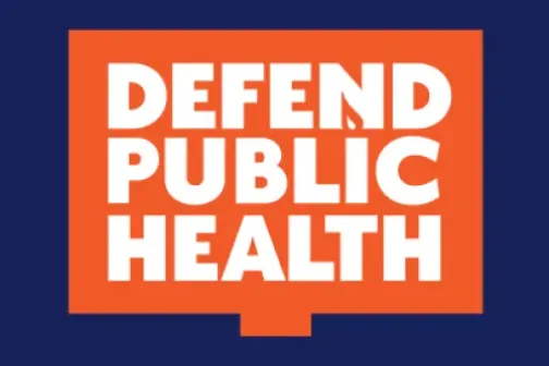 Logo for Defend Public Health. It has a blue background with an orange sign shape that says "defend public health" in white. 