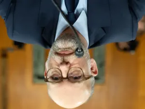 Photo of OMB Director Russell Vought, upside-down